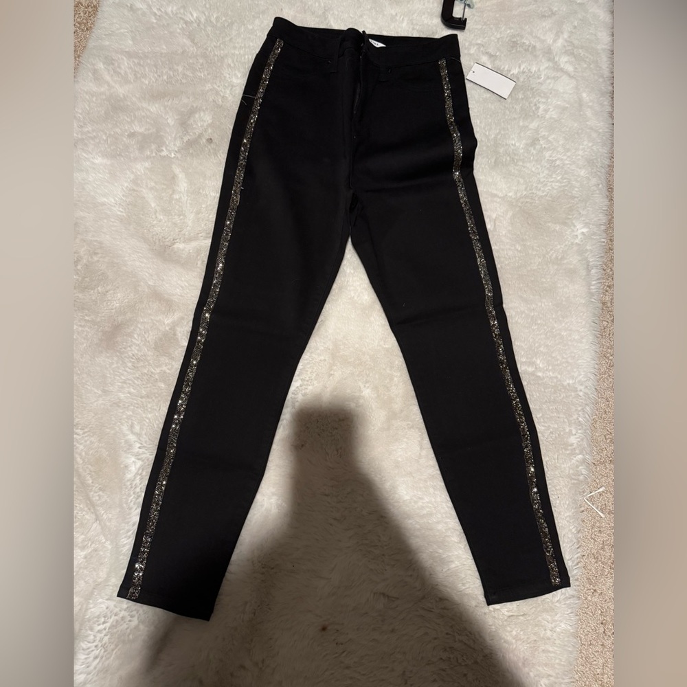 NWT black celebrity pink pants with black stones down the size.Super Cute!